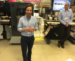 At HP Indigo headquarters in Israel, Yoav Lotan demonstrates the new HP Indigo 8000.
